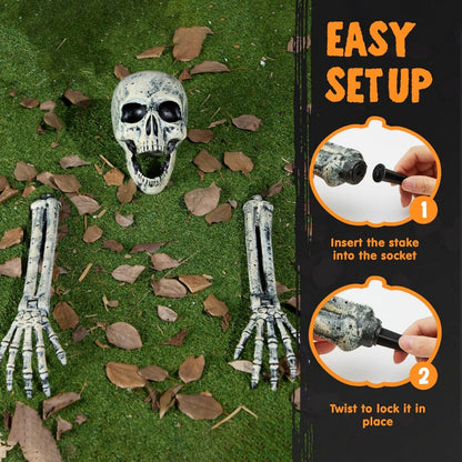Skeleton Halloween decoration set laid out on green artificial grass with scattered brown leaves, including a skull and two bone arms. A vertical instruction panel on the right shows how to assemble the stakes and bones with numbered steps and hand insets.