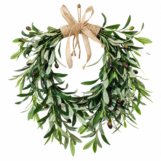 An olive green leaf wreath with small dark olives and a natural jute ribbon bow at the top, isolated on a white background.
