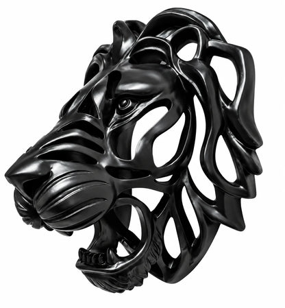 A glossy black lion head wall sculpture with an openwork, geometric design, shown against a plain white background.