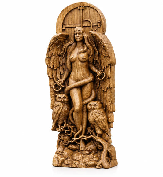 A carved wooden figurine of a winged goddess figure holding a snake, flanked by two owls, with a circular door motif at the top, shown on a plain white background.