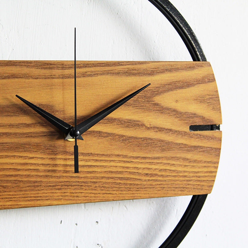 Nestbelaura wooden wall clock measuring 29 cm in diameter